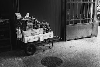 Monochrome Photography of Farm Produce on Cart for Sale