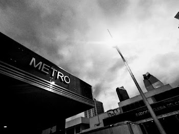 Monochrome Photography of Metro Signage
