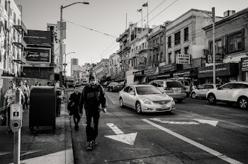 Monochrome Photography of People walking on the street