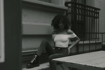 Monochrome Photography of Woman Wearing White Off-shoulder Top