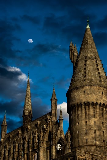Moon rises over castle