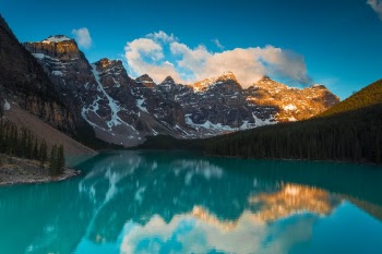 Moraine Lake has been somewhere I've wanted to visit for 15 years. Last week I finally managed to go there with my Fiancée and what an absolutely beautiful lake it is. When we landed in Calgary we had a 1.5 hour drive to our hotel in Banff and then slept for 3 hours before going on the drive up to Moraine Lake. We arrived at 5:30 to beat the crowds and got super lucky with the weather as it had rained the night before. This place is very special, and everyone should go and see it at least once. I can't wait to go back