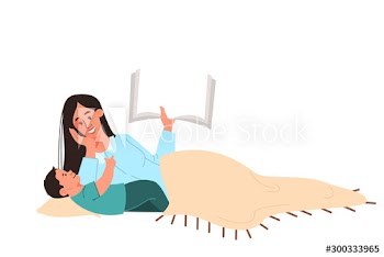 Mother reading book for a kid at bedtime
