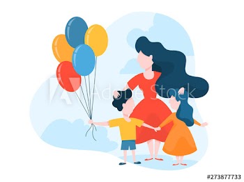 Mother standing with children holding balloon
