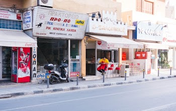 Motor Scooter Parked on Sidewalk