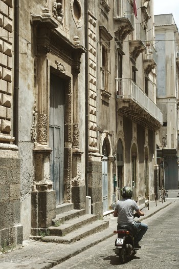 Motorbike in Catania, Sicily in Italy in baroque street