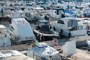 Motorboats Docked In A Harbor