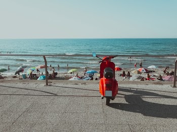 Motorcycle Parked Near Seashore