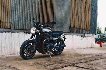 Motorcycle Parked Outside A Building