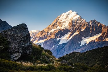 Mount Cook, illuminated by the last rays of sunlight in southern New Zealand. 