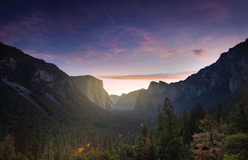 mountain beside tree field