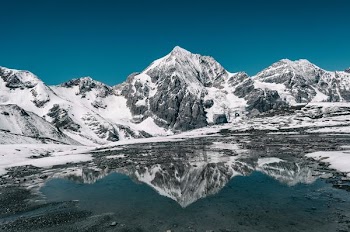 mountain coated with snow