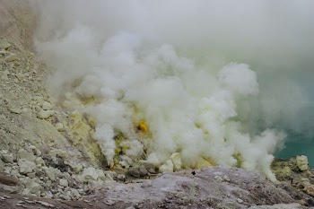 mountain covered by smoke