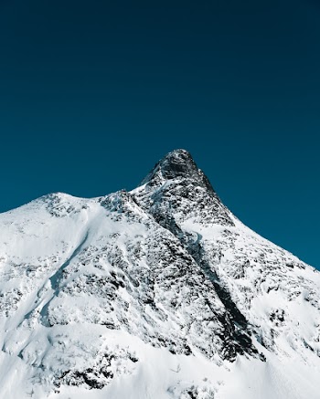 Mountain Covered By Snow