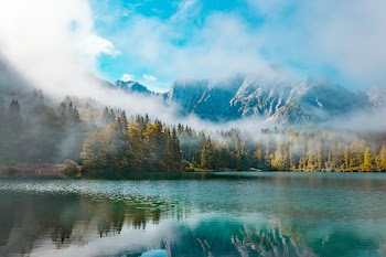 mountain covered with fog digital wallpaper