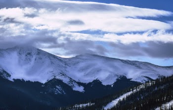 Mountain Covered With Snow Under White and Blue Skies