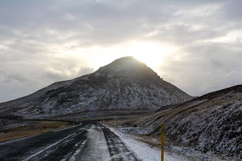 mountain near asphalt road during daytime