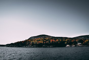 Mountain Near Body Of Water