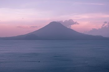 mountain near body of water