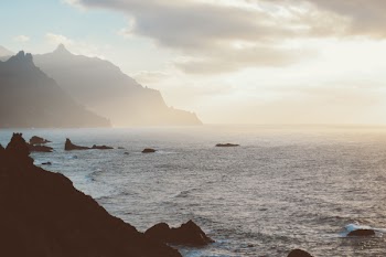 Mountain Near Body Of Water