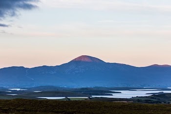 mountain near river during daytime