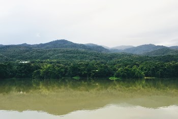 Mountain Range Near Body of Water