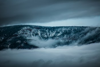 Mountain Range Surrounded by Fogs