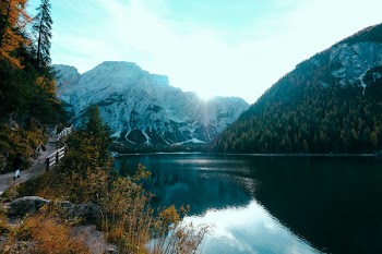 Mountain Reflecting on Body of Water
