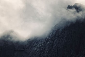 mountain surrounded by cloud formation