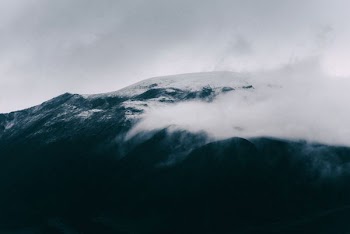 mountain touching the clouds