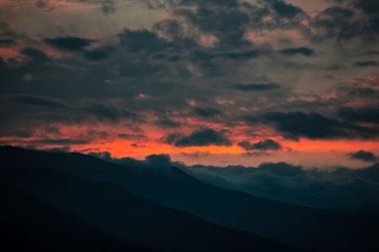 mountain under gray clouds