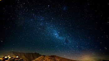 mountain under stars