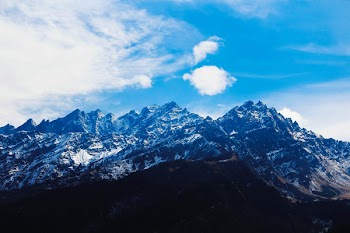 Mountain Under White Clouds at Daytime