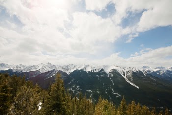 Mountain Under White Clouds during Daytime