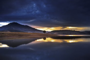 Mountain View Seen Through Across the Calm River during Dawning