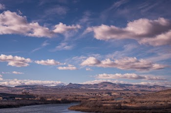 Mountain View Under White and Blue Skies