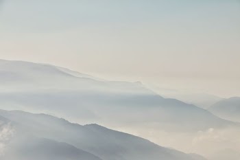 mountains during foggy season