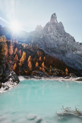 mountains near body of water