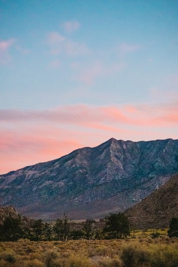 Mountains Under Blue Skies