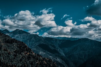 Mountains Under Cloudy Sky