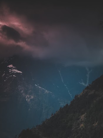 Mountains Under Dark Sky