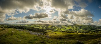 Mountains Under White Clouds