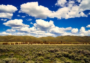 Mountains Under White Clouds