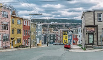 Multi-colored Buildings Under A Cloudy Day