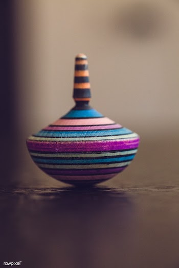 Multi-colored spinning top | Free public domain photo - 432202