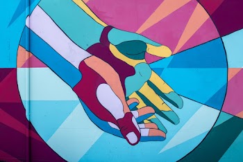Multi-coloured Painting Of Hands