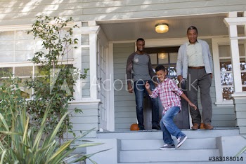 Multi-generation men on front stoop