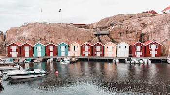 Multicolored Houses next to Dock