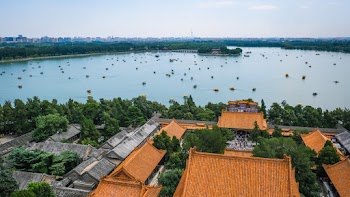 Multicolored Pagodas Near Body Of Water