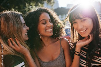 Multiracial female friends enjoying a day around the city